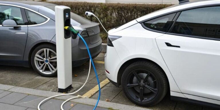 Electric cars charging at station