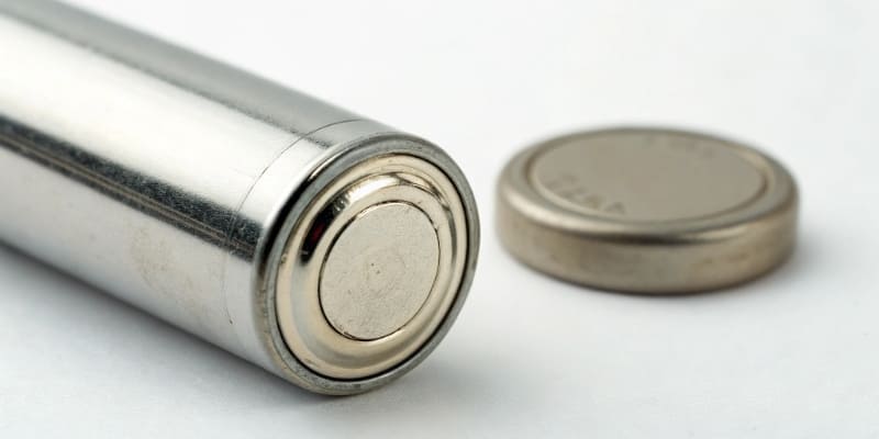 Calendar Life of a Lithium-Ion Battery A lithium-ion battery on a shelf with a calendar next to it