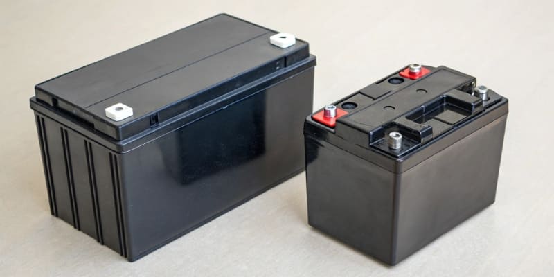 Engineers testing a custom battery pack in a thermal chamber