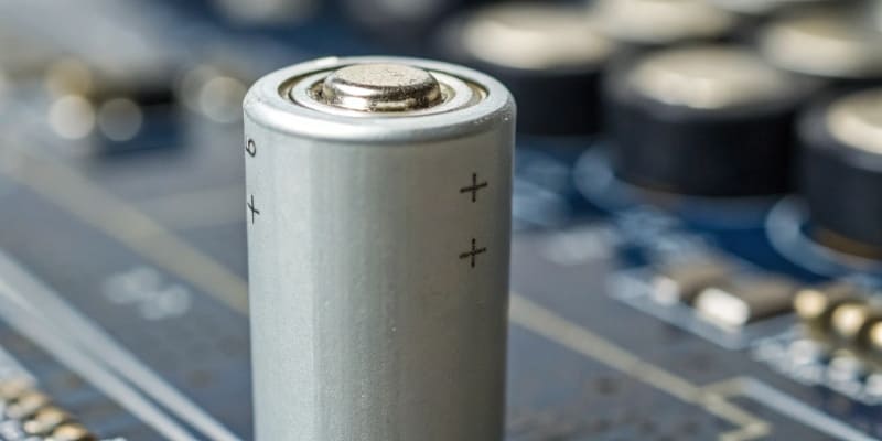 A macro photo showing the date code printed on a cylindrical battery cell