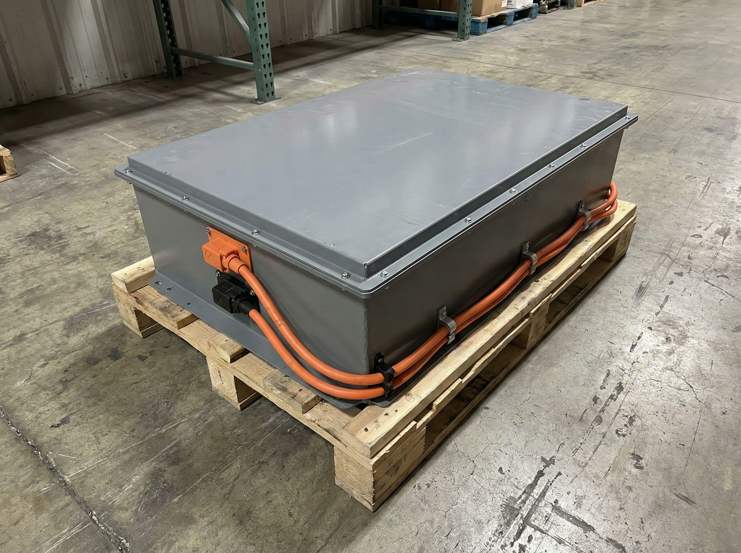 A close-up shot of an LFP battery pack being assembled