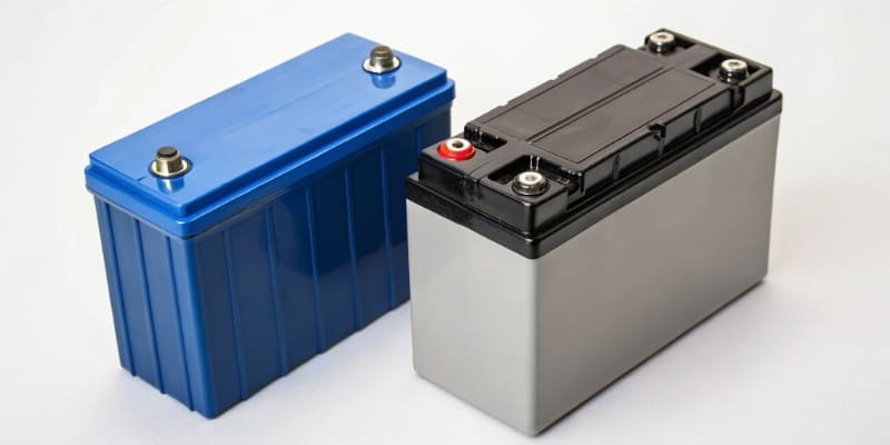 A side-by-side comparison of a lithium-ion battery and a LiFePO4 battery cell