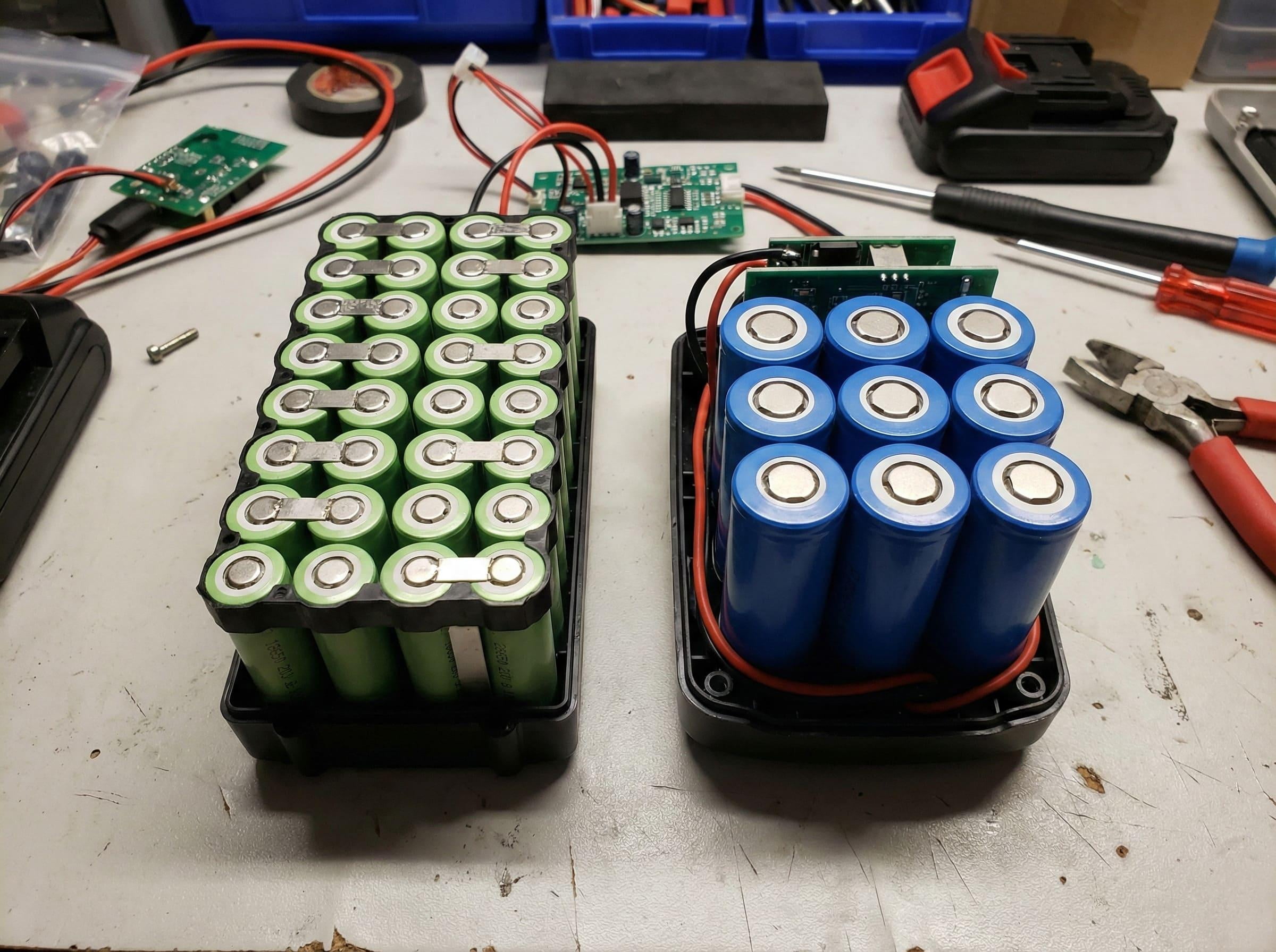 Inside a DeWalt 5.0Ah Battery Pack An opened power tool battery pack showing multiple 18650 cells inside