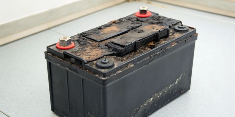 Dangers of Counterfeit Batteries A dramatic image of a burnt or swollen battery