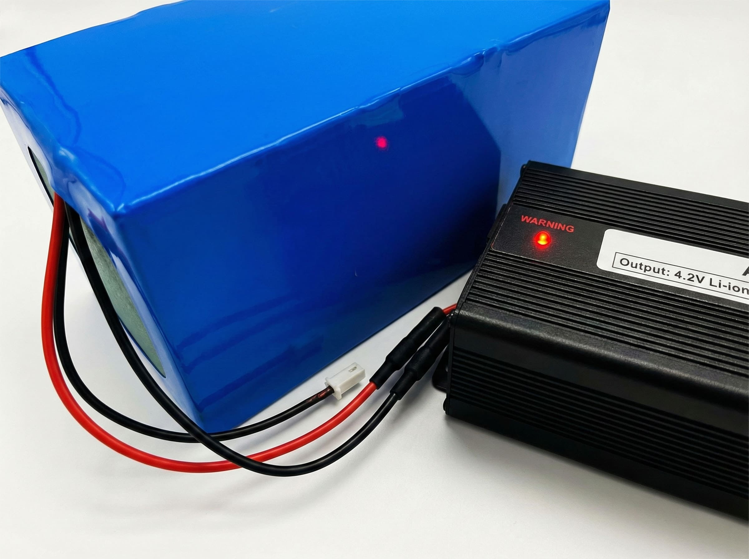 Blue lithium battery pack charging with 4.2V charger