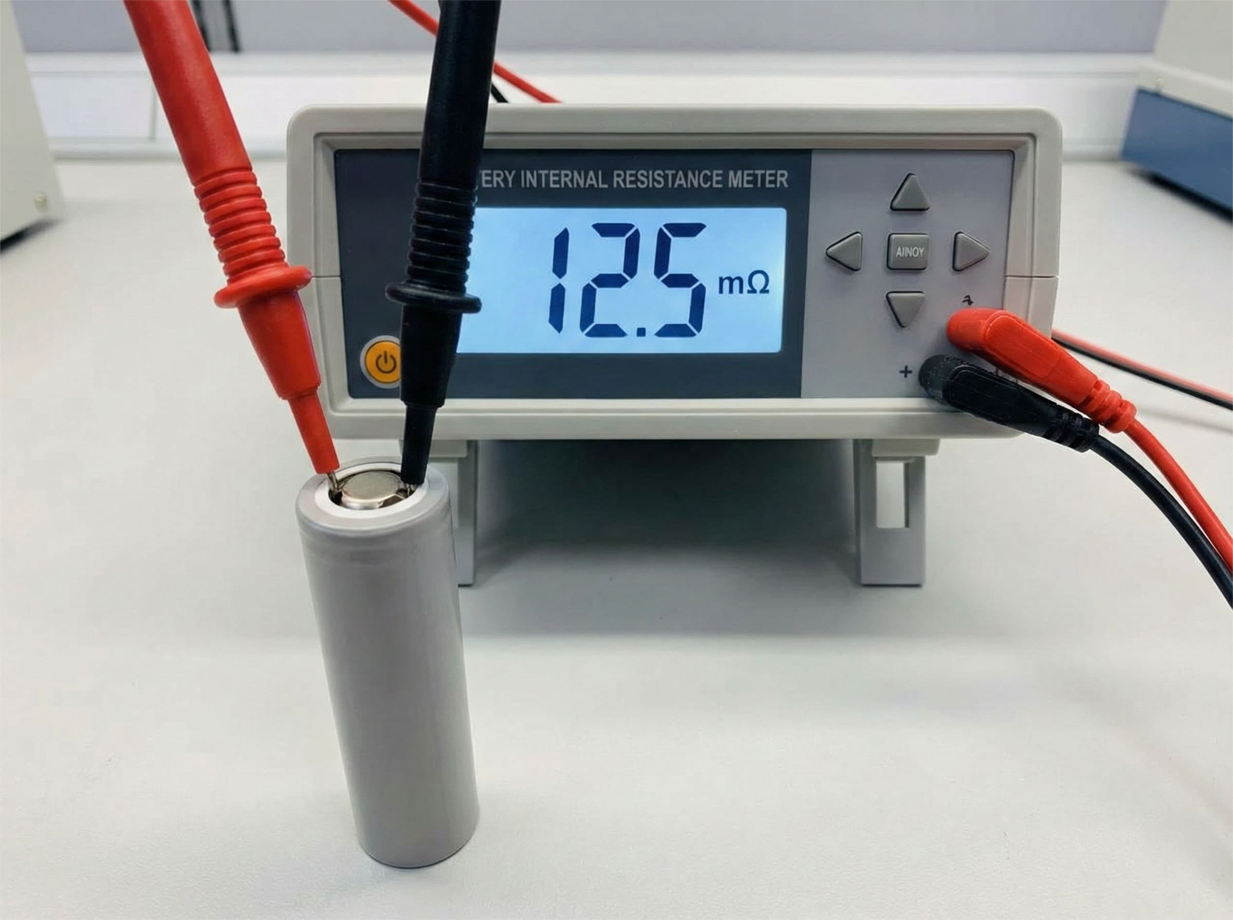 An image of a technician measuring a battery's internal resistance