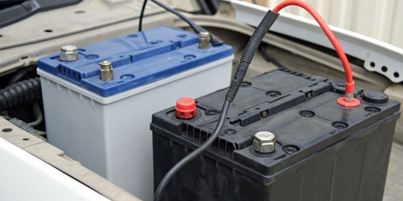 A hand receiving money with a government building and a green leaf icon in the background