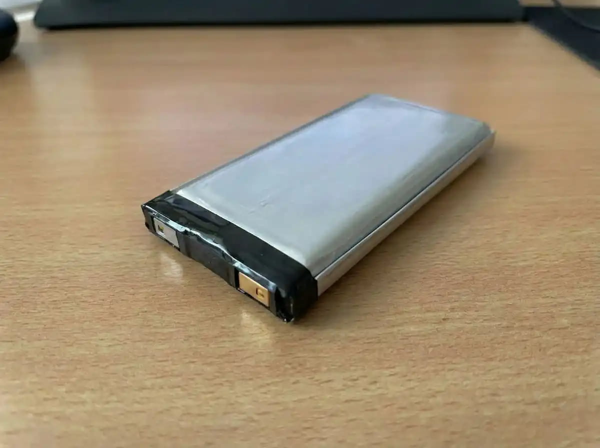 Flying with Drone LiPo Batteries A powerful LiPo drone battery next to a carry-on suitcase