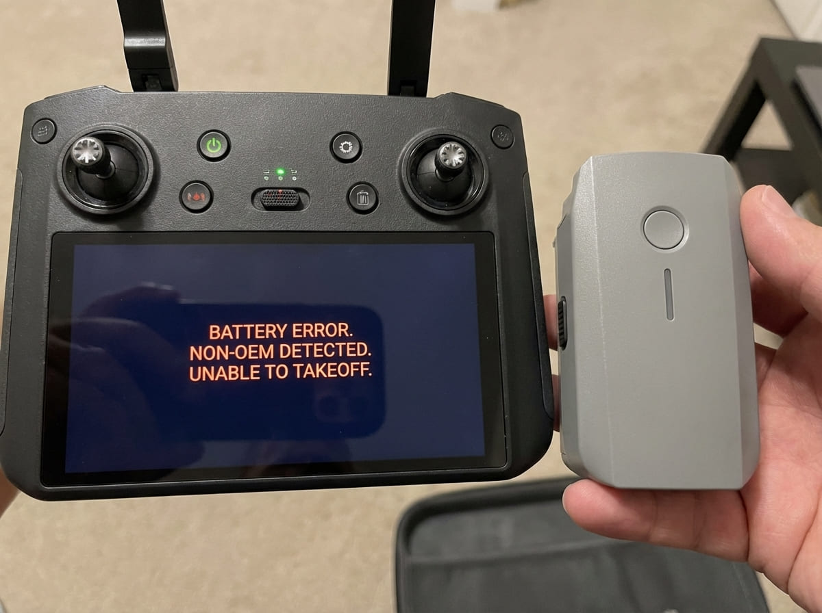 Drone Smart BMS and Third-Party Battery A close-up of a smart battery connector with multiple pins